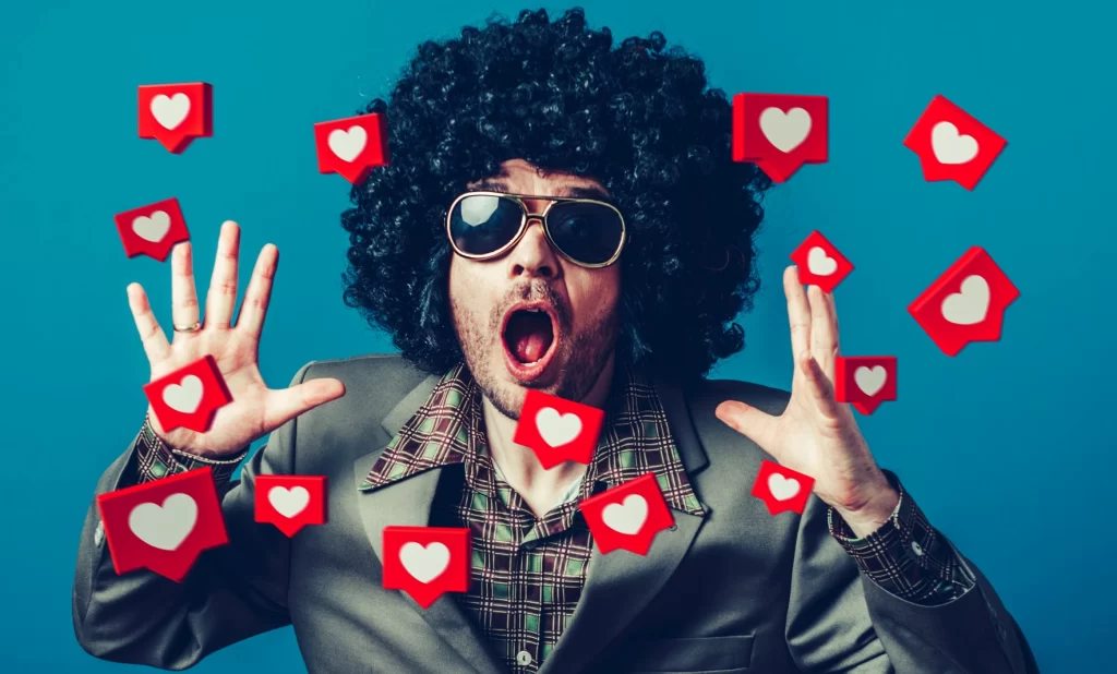 Retro man overwhelmed with social media heart reactions